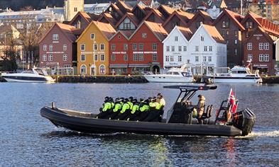 Rib-boat with Bryggen in Bergen in the background