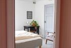 From Hallway to Double Room