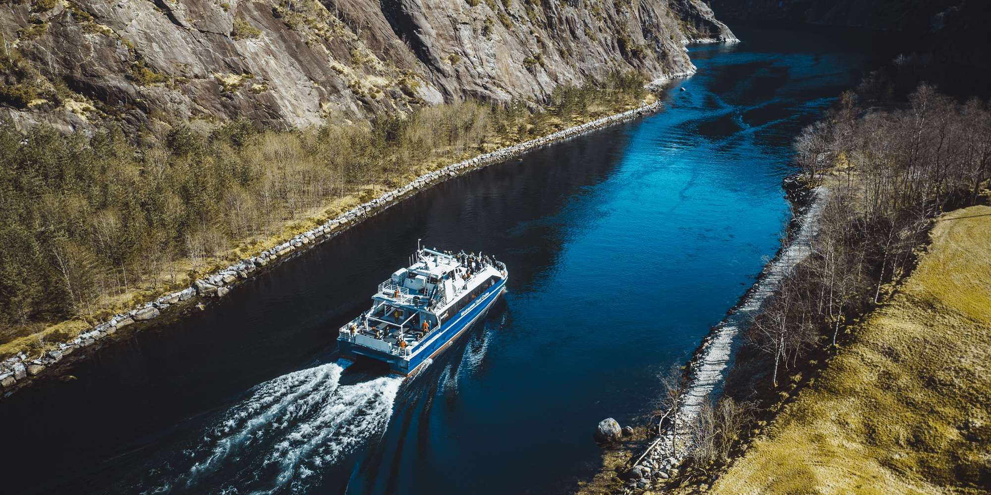The fjord cruise passes through the narrow Mostraumen